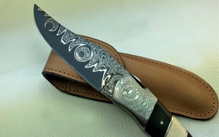 Couteau d'art CL02 ebene sertie d'onyx noir ivoire de mammouth mitres damas