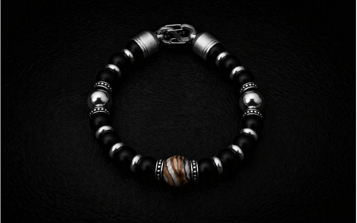 BRACELET HOMME PERLE CENTRALE EN MOLAIRE DE MAMMOUTH 2 PERLES TITANE ET ONYX NATUREL
