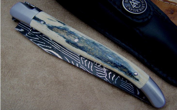 Couteau Laguiole 12 cm molaire de mammouth et lame sculpté de feuilles